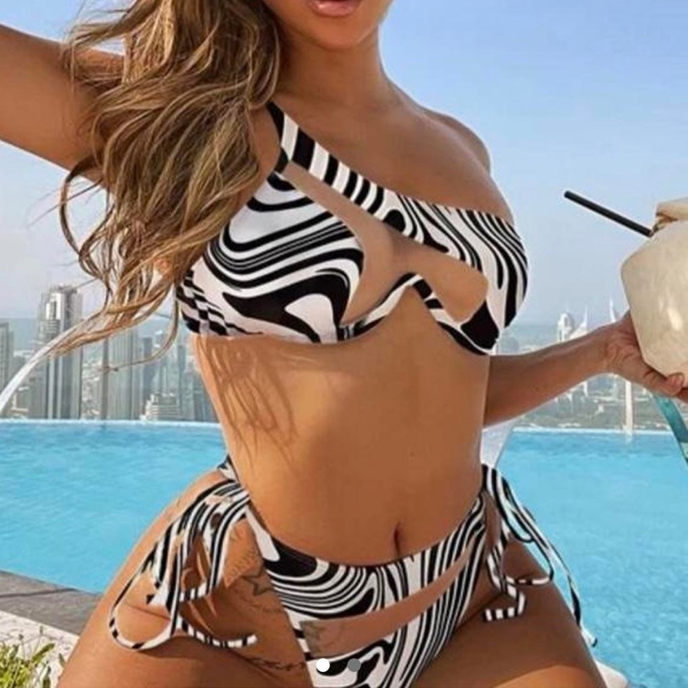 Mesh swim-suit never worn